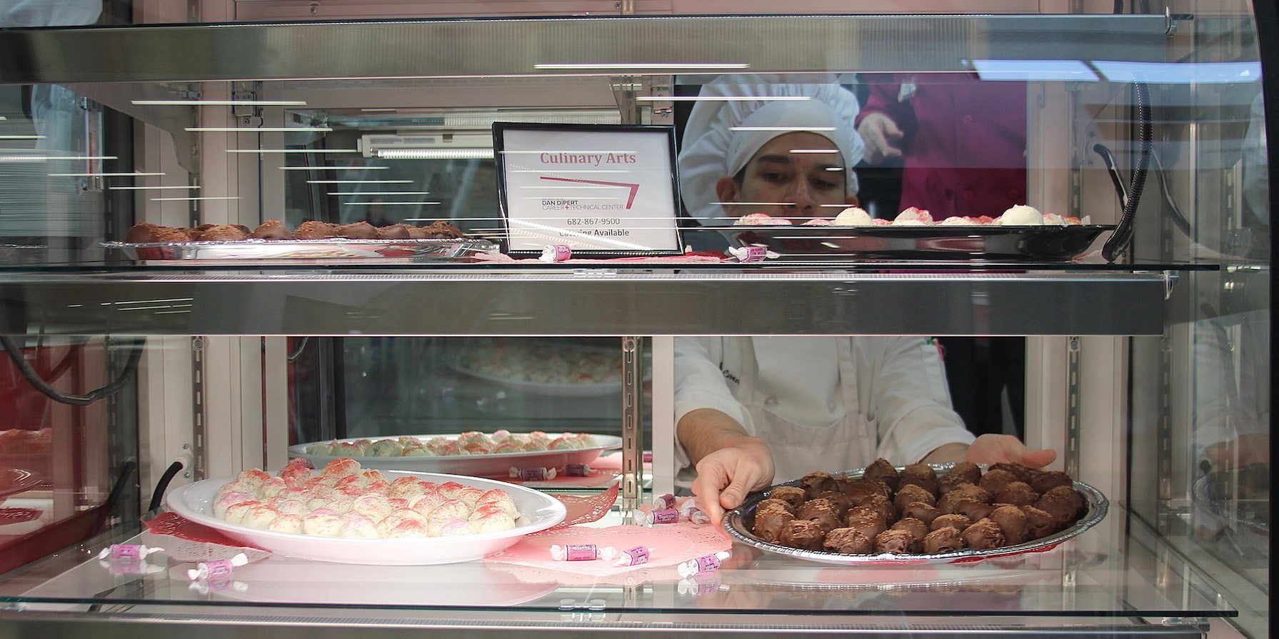 Culinary student at the CTC puts out dessert at The Bistro