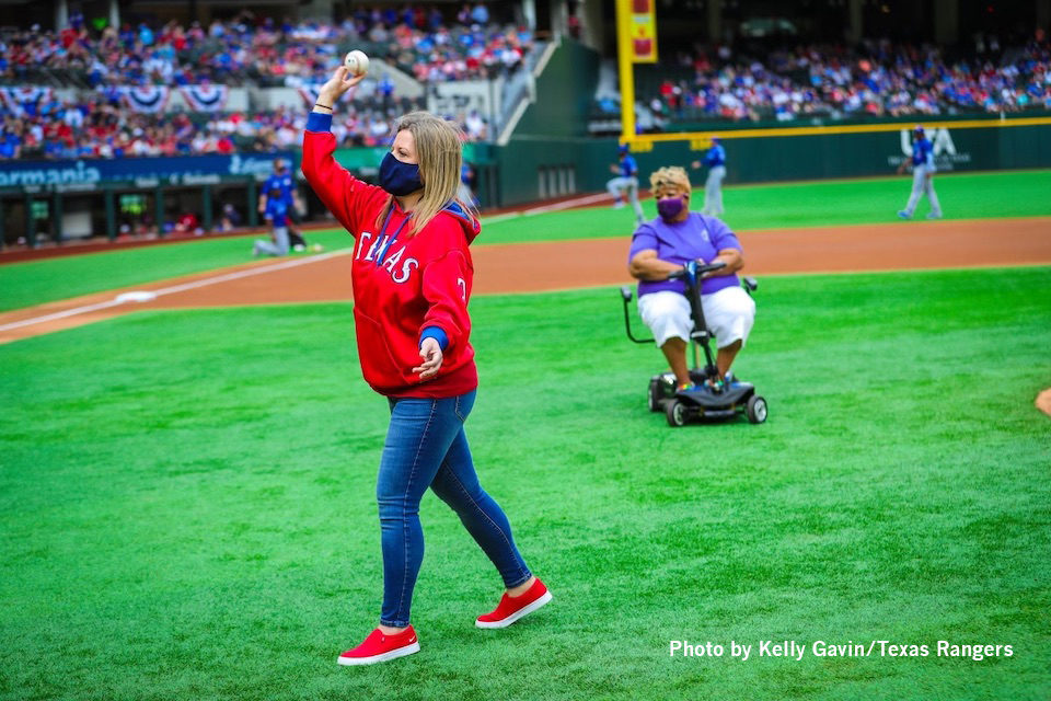 DunnTeacher with photo credit Dunn Elementary teacher throws first pitch at Texas Rangers opening day